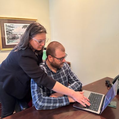 Cynthia and Geoff working together.