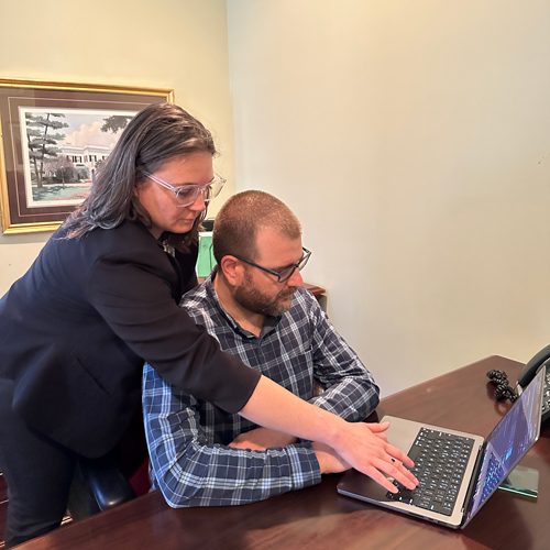 Cynthia and Geoff working together.