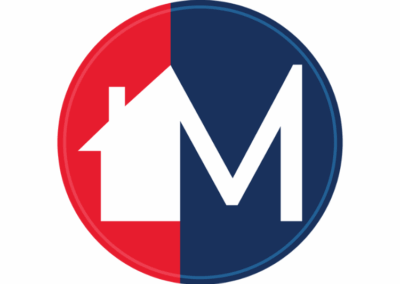 A circular logo divided in red and navy blue with a white house silhouette and a bold white letter “M" for Modern Roofing.