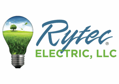 A lightbulb with a scenic green field and tree inside, next to blue and green text reading “Rytec Electric, LLC.”