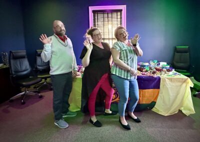 CTM team waving enthusiastically at the camera.