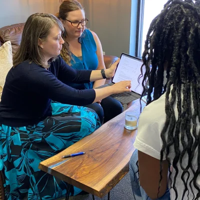 cynthia-explaining-google-search-results-to-a-client